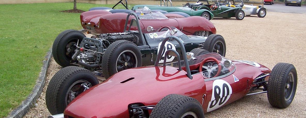 Red & Green Lineup of Lotus Cars